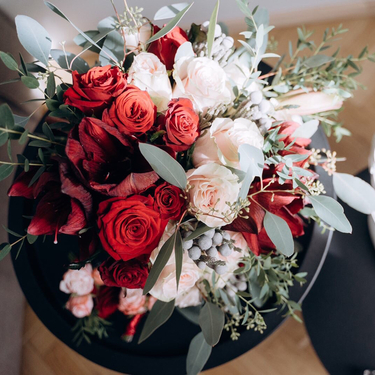 Passionate kiss - Bridal Bouquet of red roses, amaryllis, eucalyptus and mix light pink roses